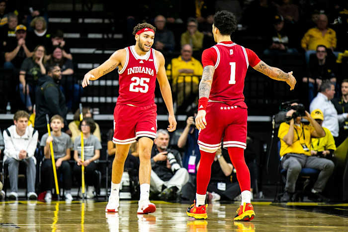 Indiana forward Race Thompson, left, high-fives Indiana guard Jalen Hood-Schifino (1) during a NCAA Big Ten Conference men's basketball game against Iowa.